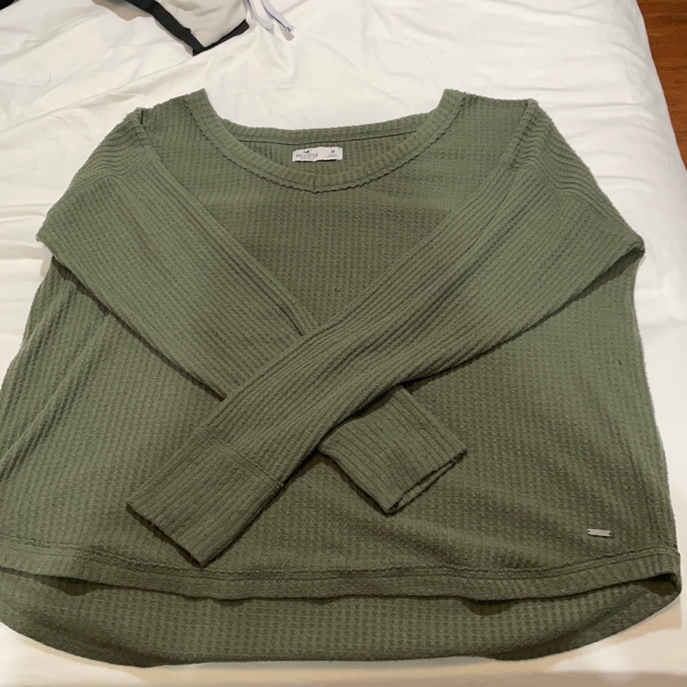 dark green sweater